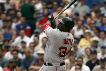 CHICAGO - JUNE 10:  Designated hitter David Ortiz #34 of the Boston Red Sox swings at a Chicago Cubs pitch during the game on June 10, 2005 at Wrigley Field in Chicago, Illinois. The Cubs defeated the Red Sox 14-6. (Photo by Jonathan Daniel/Getty Images)