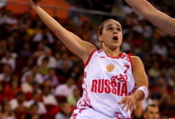 BEIJING - AUGUST 19:  Becky Hammon #7 of Russia drives for a shot attempt against Anna Montanana of Spain during the quaterfinal women's basketball match on Day 11 of the Beijing 2008 Olympic Games at the Wukesong Indoor Stadium on August 19, 2008 in Beijing, China.  (Photo by Ezra Shaw/Getty Images)