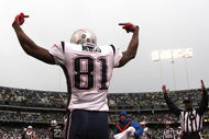 OAKLAND, CA - DECEMBER 14:  Randy Moss #81 of the New England Patriots celeberates after scoring a touchdwon against the Oakland Raiders during an NFL game on December 14, 2008 at the Oakland-Alameda County Coliseum in Oakland, California.  (Photo by Jed Jacobsohn/Getty Images)