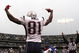 OAKLAND, CA - DECEMBER 14:  Randy Moss #81 of the New England Patriots celeberates after scoring a touchdwon against the Oakland Raiders during an NFL game on December 14, 2008 at the Oakland-Alameda County Coliseum in Oakland, California.  (Photo by Jed Jacobsohn/Getty Images)