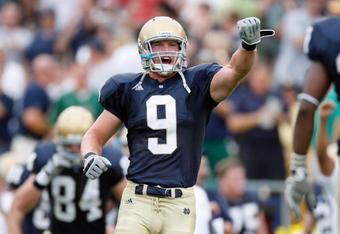 SOUTH BEND,IN - SEPTEMBER 13:  Ethan Johnson #9 of the Notre Dame Fighting Irish yells during the game against the Michigan Wolverines on September 13, 2008 at Notre Dame Stadium in South Bend, Indiana. (Photo by: Gregory Shamus/Getty Images)
