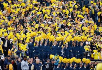 ANN ARBOR, MI - OCTOBER 25:  Fans of the Michigan Wolverines cheer from the stands during the game against the Michigan State Spartans on October 25, 2008 at Michigan Stadium in Ann Arbor, Michigan. Michigan State won the game 35-21. (Photo by Gregory Shamus/Getty Images)
