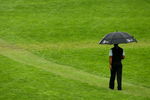 FARMINGDALE, NY - JUNE 20:  Tiger Woods walks off the first tee during the continuation of the second round of the 109th U.S. Open on the Black Course at Bethpage State Park on June 20, 2009 in Farmingdale, New York.  (Photo by Chris McGrath/Getty Images)