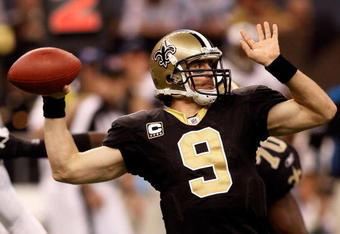 NEW ORLEANS - DECEMBER 28:  Drew Brees #9 of the New Orleans Saints looks to throw a pass against the Carolina Panthers on December 28, 2008 at the Superdome in New Orleans, Louisiana.  (Photo by Chris Graythen/Getty Images)