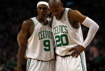 BOSTON - MAY 17:  Rajon Rondo #9 and Ray Allen #20 of the Boston Celtics talk as the Orlando Magic shoot a free throw in Game Seven of the Eastern Conference Semifinals during the 2009 NBA Playoffs at TD Banknorth Garden on May 17, 2009 in Boston, Massachusetts. The Orlando Magic defeated the Boston Celtics 101-82 to advance to the Eastern Conference Finals. NOTE TO USER: User expressly acknowledges and agrees that, by downloading and or using this photograph, User is consenting to the terms and conditions of the Getty Images License Agreement.  (Photo by Elsa/Getty Images)