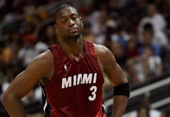 ATLANTA - MAY 03:  Dwyane Wade #3 of the Miami Heat reacts after talking with official Joe Crawford while taking on the Atlanta Hawks during Game Seven of the Eastern Conference Quarterfinals at Philips Arena on May 3, 2009 in Atlanta, Georgia. The Hawks defeated the Heat 91-78. NOTE TO USER: User expressly acknowledges and agrees that, by downloading and/or using this Photograph, user is consenting to the terms and conditions of the Getty Images License Agreement.  (Photo by Doug Benc/Getty Images)