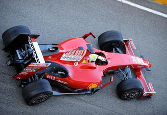 MUGELLO, ITALY - UNDATED:  In this handout image supplied by the Ferrari Press Office, Felipe Massa of Brasil leaves the garage to test drive the new Ferrari F60 Formula One 2009 season car at the Mugello race track in Italy. The name F60 was chosen in recognition of the Scuderia's participation since 1950 in all 60 editions of the Formula 1 World Championship. (Photo by Ferrari Press Office via Getty Images)