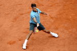 PARIS - JUNE 07:  Roger Federer of Switzerland hits a forehand during the Men's Singles Final match against Robin Soderling of Sweden on day fifteen of the French Open at Roland Garros on June 7, 2009 in Paris, France.  (Photo by Matthew Stockman/Getty Images)