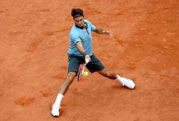 PARIS - JUNE 07:  Roger Federer of Switzerland hits a forehand during the Men's Singles Final match against Robin Soderling of Sweden on day fifteen of the French Open at Roland Garros on June 7, 2009 in Paris, France.  (Photo by Matthew Stockman/Getty Images)
