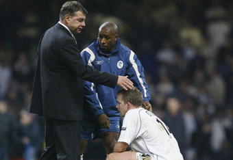 CARDIFF, WALES - FEBRUARY 29:  Kevin Davies and manager Sam Allardyce of Bolton Wanderers look dejected after their defeat to Middlesbrough in the Carling Cup Final match between Bolton Wanderers and Middlesbrough at The Millennium Stadium on February 29, 2004 in Cardiff, Wales.  (Photo by Clive Brunskill/Getty Images)