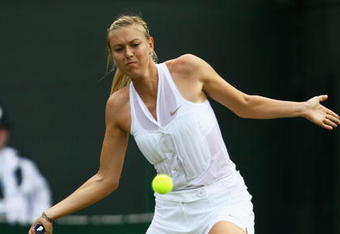 LONDON - JUNE 24:  Maria Sharapova of Russia plays a forehand during the women's singles round one match against Stephanie Foretz of France on day two of the Wimbledon Lawn Tennis Championships at the All England Lawn Tennis and Croquet Club on June 24, 2008 in London, England.  (Photo by Clive Brunskill/Getty Images)