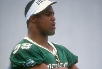 29 Aug 1998:  Defensive end Dimitrius Underwood #99 of the Michigan State Spartans looks on during the Black Coaches Association Football Classic game against the Colorado State Rams at the Spartan Stadium in East Lansing, Michigan. The Rams defeated the