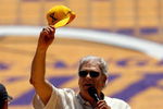 LOS ANGELES, CA - JUNE 17:  Head coach Phil Jackson of the Los Angeles Lakers addresses the crowd during the 2009 NBA Championship Victory Parade at the Los Angeles Memorial Coliseum on June 17, 2009 in Los Angeles, California.  (Photo by Jeff Gross/Getty Images)