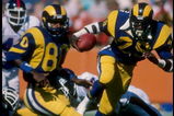 23 Dec 1984:  Running back Eric Dickerson of the Los Angeles Rams runs down the field during a game against the New York Giants at Anaheim Stadium in Anaheim, California.  Mandatory Credit: Tony Duffy  /Allsport