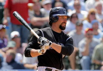 DENVER - MAY 14:  First baseman Todd Helton #17 of the Colorado Rockies takes an at bat against the Houston Astros during MLB action at Coors Field on May 14, 2009 in Denver, Colorado. The Astros defeated the Rockies 5-3.  (Photo by Doug Pensinger/Getty Images)