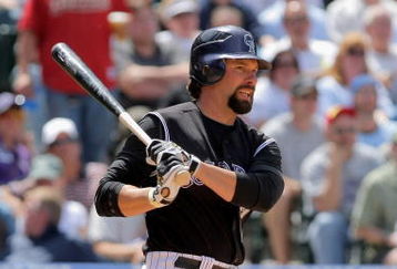 DENVER - MAY 14:  First baseman Todd Helton #17 of the Colorado Rockies takes an at bat against the Houston Astros during MLB action at Coors Field on May 14, 2009 in Denver, Colorado. The Astros defeated the Rockies 5-3.  (Photo by Doug Pensinger/Getty Images)