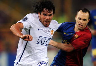 ROME - MAY 27:  Carlos Tevez of Manchester United battles for the ball with Andres Iniesta of Barcelona  during the UEFA Champions League Final match between Barcelona and Manchester United at the Stadio Olimpico on May 27, 2009 in Rome, Italy.  (Photo by Shaun Botterill/Getty Images)