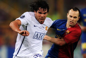 ROME - MAY 27:  Carlos Tevez of Manchester United battles for the ball with Andres Iniesta of Barcelona  during the UEFA Champions League Final match between Barcelona and Manchester United at the Stadio Olimpico on May 27, 2009 in Rome, Italy.  (Photo by Shaun Botterill/Getty Images)