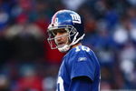 EAST RUTHERFORD, NJ -  JANUARY 11:  Eli Manning #10 of the New York Giants looks on against the Philadelphia Eagles during the NFC Divisional Playoff Game on January 11, 2009 at Giants Stadium in East Rutherford, New Jersey.  The Eagles defeated the Giants 23 -11. (Photo by Chris McGrath/Getty Images)