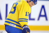 20 Feb 2002: Mats Sundin #13 of Sweden reacts after the 4-3 the upset win by Belarus during the game at the Salt Lake City Winter Olympic at the E Center in Salt Lake City, Utah. DIGITAL IMAGE. Mandatory Credit: Al Bello/Getty Images