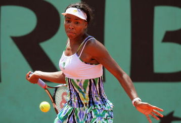 PARIS - MAY 29:  Venus Williams of USA hits a forehand during the Women's Singles Third Round match against Agnes Szavay of Hungary on day six of the French Open at Roland Garros on May 29, 2009 in Paris, France.  (Photo by Matthew Stockman/Getty Images)