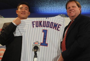 CHICAGO - DECEMBER 19:  Chicago Cubs general manager Jim Hendry (R) introduces Japanese Baseball player Kosuke Fukudome #1 (L) as their new outfielder at Wrigley Field December 19, 2007 in Chicago, Illinois.  (Photo by David Blanks/Getty Images)