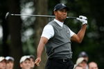 FARMINGDALE, NY - JUNE 19:  Tiger Woods watches his tee shot on the tenth hole during the continuation of the first round of the 109th U.S. Open on the Black Course at Bethpage State Park on June 19, 2009 in Farmingdale, New York.  (Photo by Nick Laham/Getty Images)
