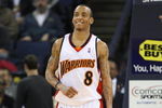 OAKLAND, CA - MARCH 30:  Monta Ellis #8 of the Golden State Warriors looks on against the Memphis Grizzlies during an NBA game on March 30, 2009 at Oracle Arena in Oakland, California. NOTE TO USER: User expressly acknowledges and agrees that, by downloading and or using this photograph, User is consenting to the terms and conditions of the Getty Images License Agreement.  (Photo by Jed Jacobsohn/Getty Images)
