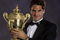 LONDON - JULY 8:  Roger Federer of Switzerland, men's singles Wimbledon champion, poses with the trophy at the Champions' Dinner on July 8, 2007 at The Savoy, London, England. (Photo by Bob Martin-Pool/Getty Images) 