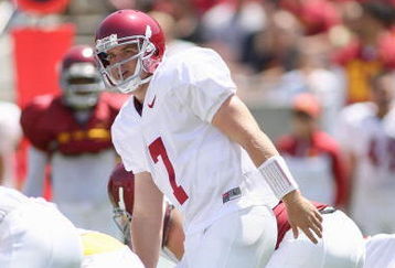 LOS ANGELES, CA - APRIL 25: Quarterback Matt Barkley #7 of the USC Trojans at the line of scrimmage during the spring game on April 25, 2009 at the Los Angeles Memorial Coliseum in Los Angeles, California.  The cardinal team won 16-10.  (Photo by Jeff Golden/Getty Images)