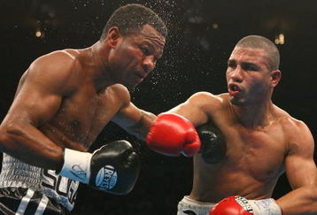 NEW YORK - NOVEMBER 10:  Miguel Cotto connects on a punch to the face during his WBA Welterweight title fight against Shane Mosley at Madison Square Garden on November 10, 2007 in New York City, New York. (Photo by Al Bello/Getty Images)
