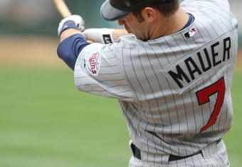 OAKLAND, CA - JUNE 11: Joe Mauer #7 of the Minnesota Twins bats against the Oakland Athletics during a Major League Baseball game on June 11, 2009 at the Oakland Coliseum in Oakland, California. (Photo by Jed Jacobsohn/Getty Images)