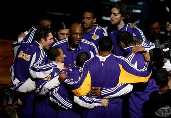 ORLANDO, FL - JUNE 14:  The Los Angeles Lakers led by Lamar Odom #7 in the middle gather before taking on the Orlando Magic in Game Five of the 2009 NBA Finals on June 14, 2009 at Amway Arena in Orlando, Florida.  NOTE TO USER:  User expressly acknowledges and agrees that, by downloading and or using this photograph, User is consenting to the terms and conditions of the Getty Images License Agreement.  (Photo by Chris Graythen/Getty Images)