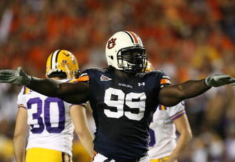 AUBURN, AL - SEPTEMBER 20: Defensive lineman Tez Doolittle #99 of the Auburn Tigers celebrates after place kicker Colt David #6 of the LSU Tigers missed a field goal at Jordan-Hare Stadium on September 20, 2008 in Auburn, Alabama. (Photo by Doug Benc/Getty Images)