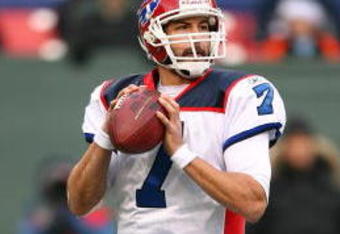 EAST RUTHERFORD, NJ - DECEMBER 14:  JP Losman #7 of The Buffalo Bills drops back to pass against The New York Jets during their game on December 14, 2008 at Giants Stadium in East Rutherford, New Jersey.  (Photo by Al Bello/Getty Images)