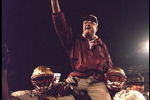 1 Jan 1996:  Head coach Bobby Bowden of the Florida State Seminoles is carried triumphantly off the field by nose guard Andre Wadsworth #8 and tackle Orpheus Roy after defeating the Notre Dame Fighting Irish in the Orange Bowl in Miami, Florida 31-26.  Ma