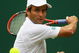 LONDON - JUNE 24: Fabrice Santoro of France plays a backhand during the men's singles round one match against Andy Murray of United Kingdom on day two of the Wimbledon Lawn Tennis Championships at the All England Lawn Tennis and Croquet Club on June 24, 2008 in London, England. (Photo by Julian Finney/Getty Images)