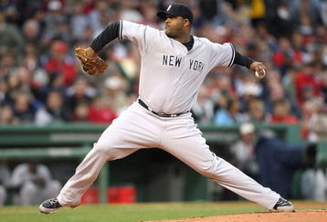 BOSTON - JUNE 11: CC Sabathia #52 of  New York Yankees throws against the Boston Red Sox at Fenway Park on June 11, 2009 in Boston, Massachusetts.  (Photo by Jim Rogash/Getty Images)