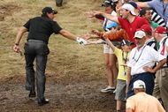 FARMINGDALE, NY - JUNE 21:  Phil Mickelson walks past fans to the 18th tee during the continuation of the third round of the 109th U.S. Open on the Black Course at Bethpage State Park on June 21, 2009 in Farmingdale, New York.  (Photo by Ross Kinnaird/Getty Images)