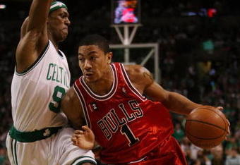 BOSTON - MAY 02:  Derrick Rose #1 of the Chicago Bulls drives to the net as Rajon Rondo #9 of the Boston Celtics defends in Game Seven of the Eastern Conference Quarterfinals during the 2009 NBA Playoffs at TD Banknorth Garden on May 2, 2009 in Boston, Massachusetts. The Celtics defeated the Bulls 109-99. NOTE TO USER: User expressly acknowledges and agrees that, by downloading and or using this photograph, User is consenting to the terms and conditions of the Getty Images License Agreement.  (Photo by Elsa/Getty Images)