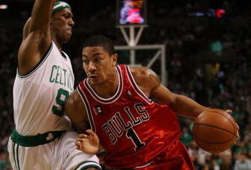 BOSTON - MAY 02:  Derrick Rose #1 of the Chicago Bulls drives to the net as Rajon Rondo #9 of the Boston Celtics defends in Game Seven of the Eastern Conference Quarterfinals during the 2009 NBA Playoffs at TD Banknorth Garden on May 2, 2009 in Boston, Massachusetts. The Celtics defeated the Bulls 109-99. NOTE TO USER: User expressly acknowledges and agrees that, by downloading and or using this photograph, User is consenting to the terms and conditions of the Getty Images License Agreement.  (Photo by Elsa/Getty Images)
