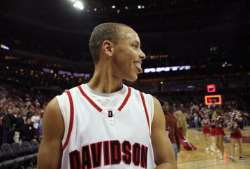 CHARLOTTE, NC - DECEMBER 6:  Stephen Curry #30 of the Davidson Wildcats smiles during the game against the North Carolina State Wolfpack at Time Warner Cable Arena on December 6, 2008 in Charlotte, North Carolina. (Photo by Streeter Lecka/Getty Images)