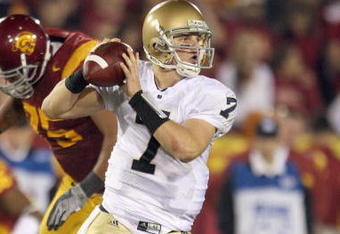 LOS ANGELES - NOVEMBER 29:  Quarterback Jimmy Clausen #7 of the Notre Dame Fighting Irish looks to pass the ball during the game against the USC Trojans at the Memorial Coliseum on November 29, 2008 in Los Angeles, California. (Photo by: Jeff Gross/Getty Images)