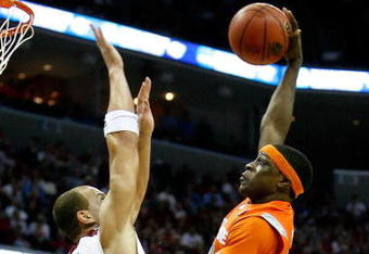 MEMPHIS, TN - MARCH 27:  Jonny Flynn #10 of the Syracuse Orange goes up for a dunk over Taylor Griffin #32 of the Oklahoma Sooners in the second half during the NCAA Men's Basketball Tournament South Regionals at the FedExForum on March 27, 2009 in Memphis, Tennessee. The Sooners defeated the Orange 84-71.  (Photo by Joe Murphy/Getty Images)