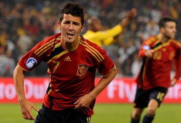 BLOEMFONTEIN, SOUTH AFRICA - JUNE 20:  David Villa of Spain celebrates scoring his sides opening goal during the FIFA Confederations Cup match between Spain and South Africa at Free State Stadium on June 20, 2009 in Bloemfontein, South Africa.  (Photo by Jasper Juinen/Getty Images)