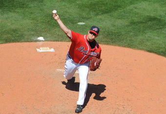 ATLANTA - APRIL 12: Pitcher Jeff Bennett #30 of the Atlanta Braves throws in relief against the Washington Nationals April 12, 2009 at Turner Field in Atlanta, Georgia.  (Photo by Al Messerschmidt/Getty Images) 