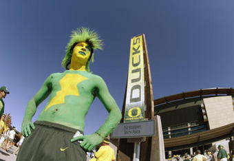 EUGENE, OR - SEPTEMBER 27:  A University of Oregon fan poses outside the Autzen stadium before the game against the Washington State University Cougars on September 27, 2003 in Eugene, Oregon. Washington State defeated Oregon 55-16.  (Photo by Jonathan Ferrey/Getty Images)