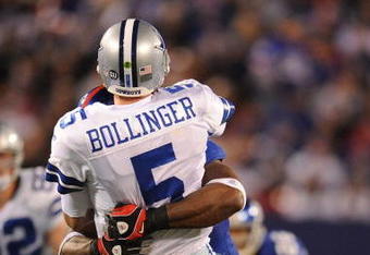 EAST RUTHERFORD, NJ - NOVEMBER 02:  Justin Tuck #91 of the New York Giants sacks Brooks Bollinger #5 of the Dallas Cowboys during their game on November 2, 2008 at Giants Stadium in East Rutherford, New Jersey.  (Photo by Al Bello/Getty Images)