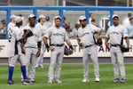 NEW YORK - JULY 14:  (L-R) National League All-Stars Hanley Ramirez #2 of the Florida Marlins, Aramis Ramirez #16 of the Chicago Cubs, Edinson Volquez #36 of the  Cincinnati Reds and Carlos Marmol #49 of the Chicago Cubs look on during batting practice for the 2008 MLB All-Star game at Yankee Stadium on July 14, 2008 in the Bronx borough of New York City.  (Photo by Nick Laham/Getty Images)