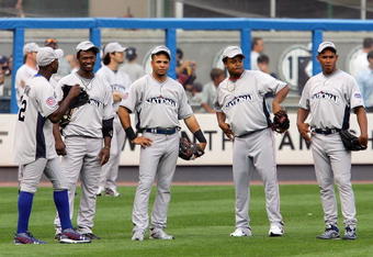 NEW YORK - JULY 14:  (L-R) National League All-Stars Hanley Ramirez #2 of the Florida Marlins, Aramis Ramirez #16 of the Chicago Cubs, Edinson Volquez #36 of the  Cincinnati Reds and Carlos Marmol #49 of the Chicago Cubs look on during batting practice for the 2008 MLB All-Star game at Yankee Stadium on July 14, 2008 in the Bronx borough of New York City.  (Photo by Nick Laham/Getty Images)
